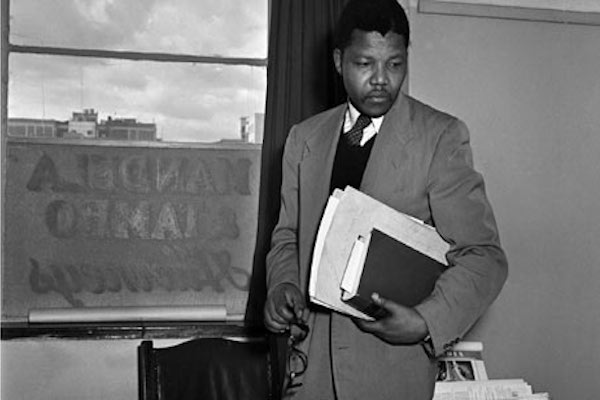 Nelson Mandela at work in the Johannesburg office where he and Oliver Tambo practised law together during the apartheid era. Photograph: Jurgen Schadeberg